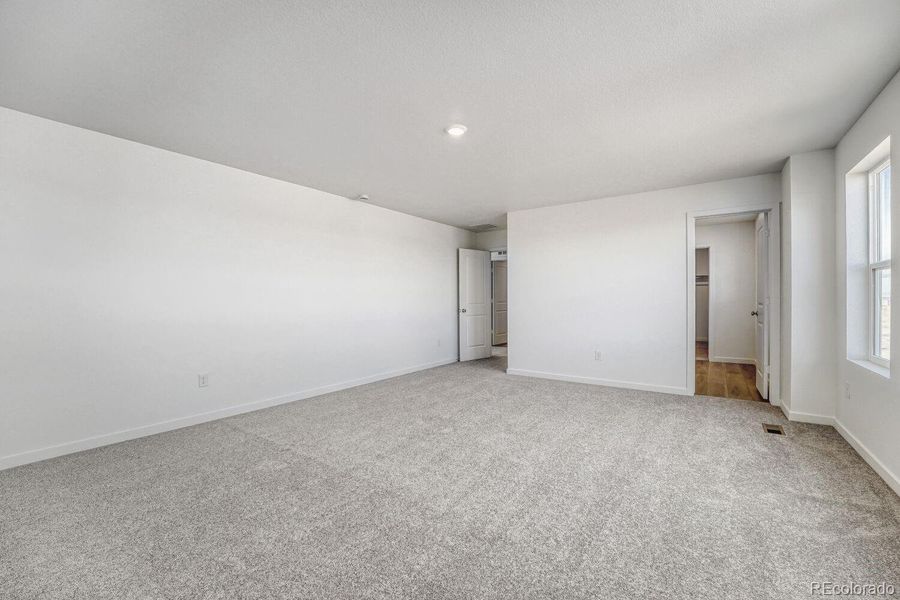 Spacious, unfurnished interior of a new home in Muegge Farms, Bennett (Image 10).