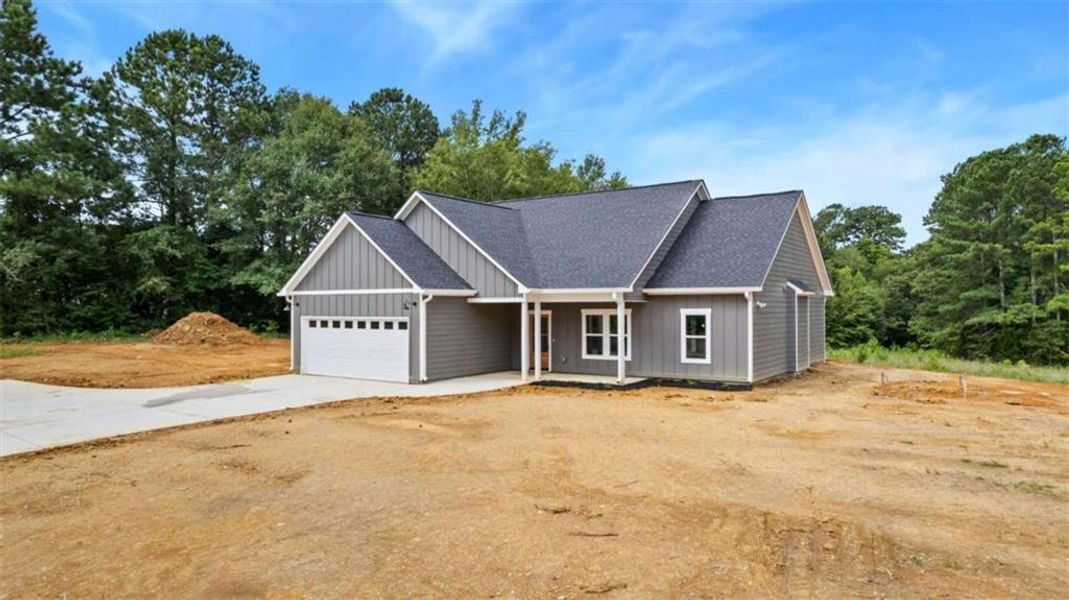Front exterior of a new home in , Cedartown, GA, highlighting curb appeal (Image 2).