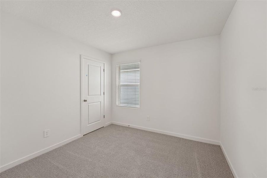 Spacious, unfurnished interior of a new home in Flagler Village - Classic Series, Palm Coast (Image 19). Spacious, unfurnished interior of a new home in Flagler Village - Classic Series, Palm Coast (Image 19).