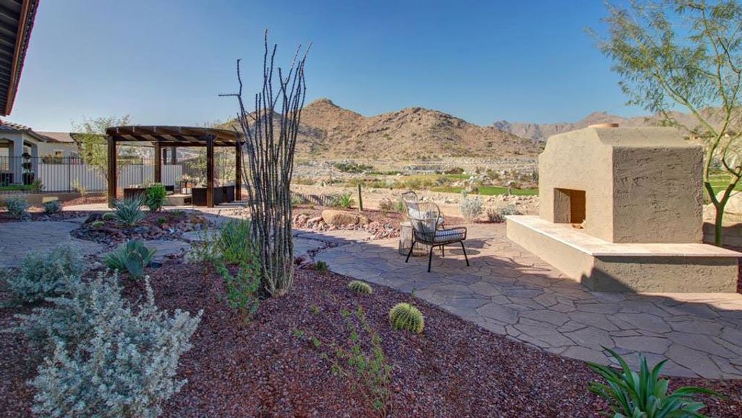 Representative exterior photo of a completed home built from the Shire by Taylor Morrison in Victory at Verrado Venture II Collection 55+, Buckeye, AZ (Image 23).