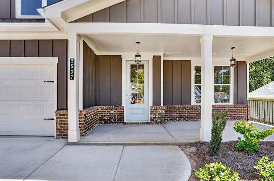 Exterior details and patio area of a home in The Manor at Gainesville Township, Gainesville (Image 21).