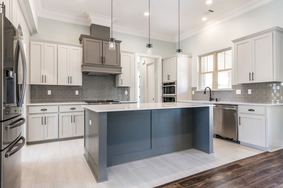 Representative furnished interior of a home built from the The Champagne by Manuel Builders in Chapel Bend, Montgomery (Image 31). Representative furnished interior of a home built from the The Champagne by Manuel Builders in Chapel Bend, Montgomery (Image 31).