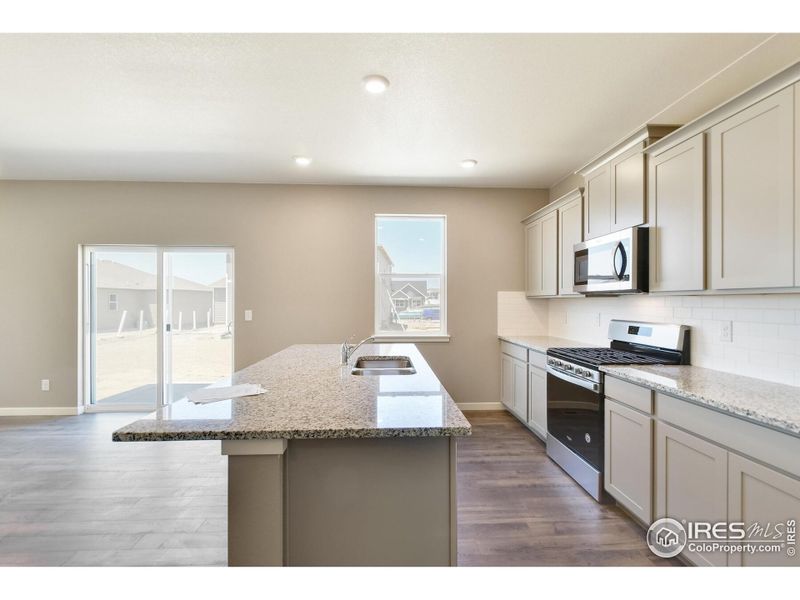 Furnished interior view inside a new home in Settlers Crossing, Commerce City (Image 8).