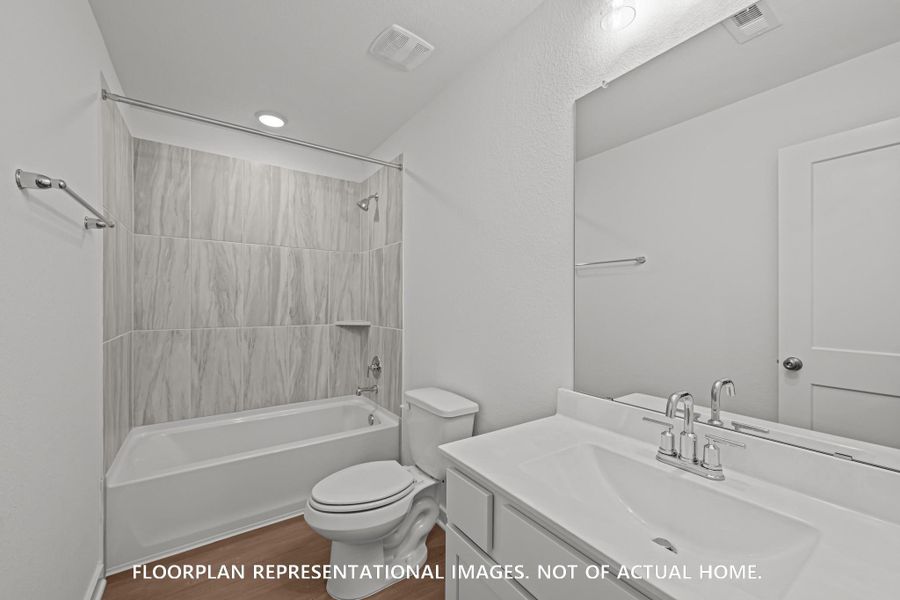 Furnished interior view inside a new home in Sorella, Tomball (Image 6).