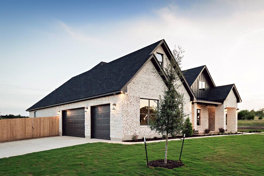 Front exterior of a new home in , Salado, TX, highlighting curb appeal (Image 1). Front exterior of a new home in , Salado, TX, highlighting curb appeal (Image 1).