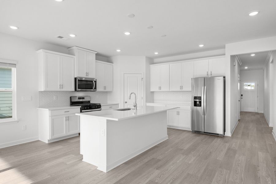 Furnished interior view inside a new home in Cypress Ridge - The Coastline Series, Longs (Image 9). Furnished interior view inside a new home in Cypress Ridge - The Coastline Series, Longs (Image 9).