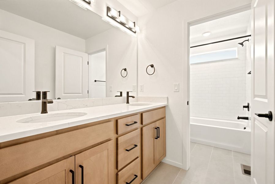 Furnished interior view inside a new home in Cordovan, Firestone (Image 12).