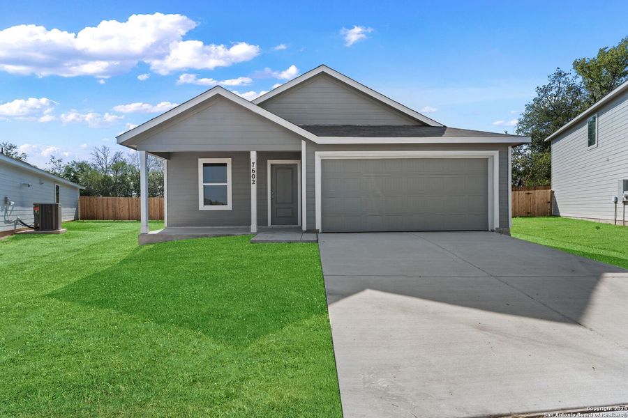 Front exterior of a new home in Torian Village: Watermill Collection, San Antonio, TX, highlighting curb appeal (Image 1). Front exterior of a new home in Torian Village: Watermill Collection, San Antonio, TX, highlighting curb appeal (Image 1).