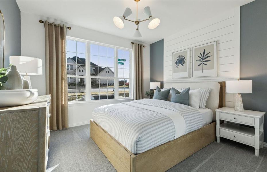 Secondary bedroom designed for comfort and convenience *Model representation