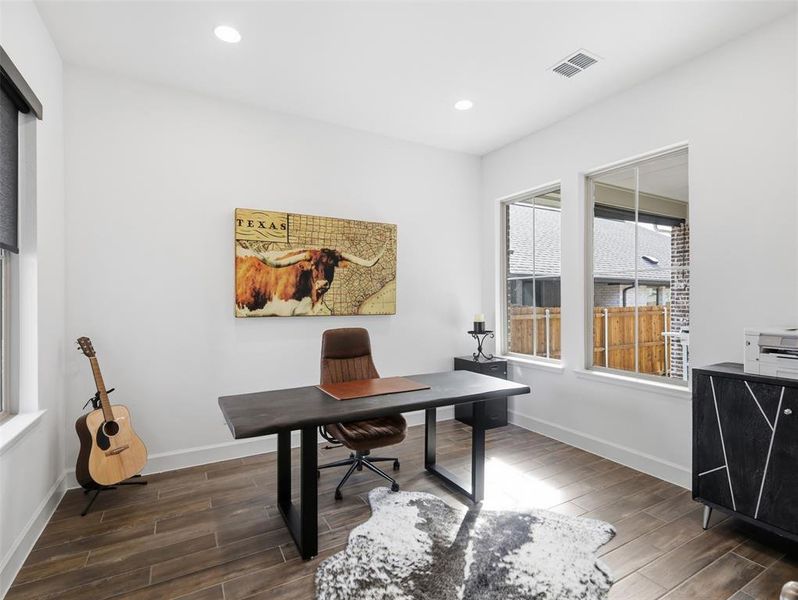 Oversized office is inundated with tons of natural light!