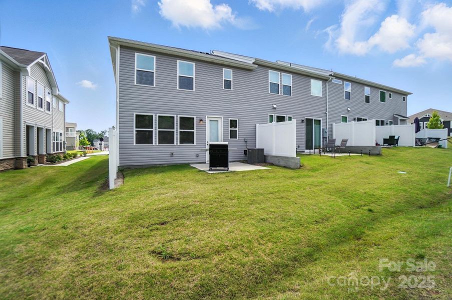 Front exterior of a new home in Porter's Row, Charlotte, NC, highlighting curb appeal (Image 1). Front exterior of a new home in Porter's Row, Charlotte, NC, highlighting curb appeal (Image 1).