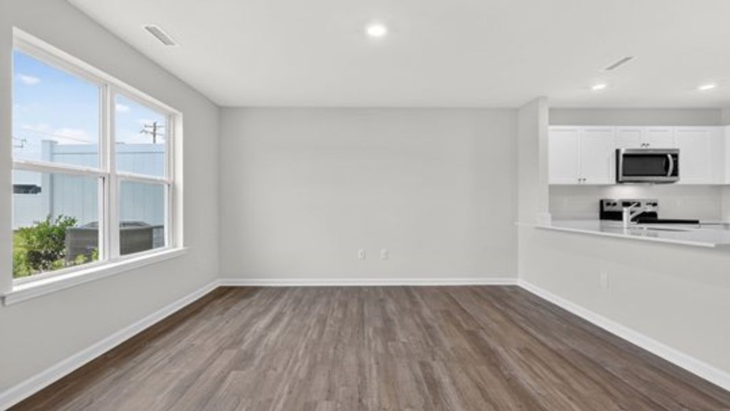 Spacious, unfurnished interior of a new home in The Townes at Belle Grove, Wendell (Image 10).