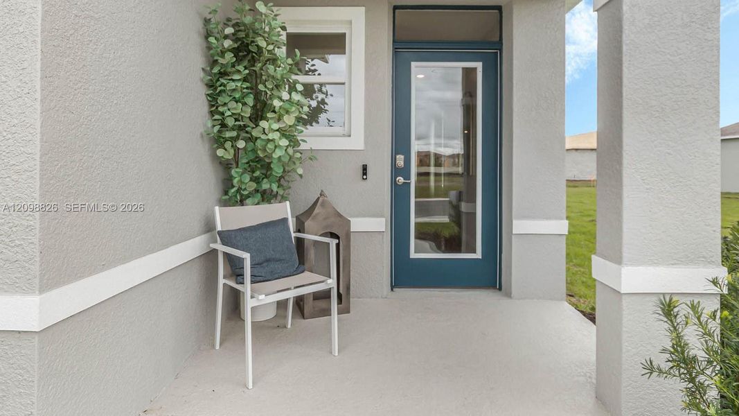 Exterior details and patio area of a home in Cascades, Davenport (Image 3).