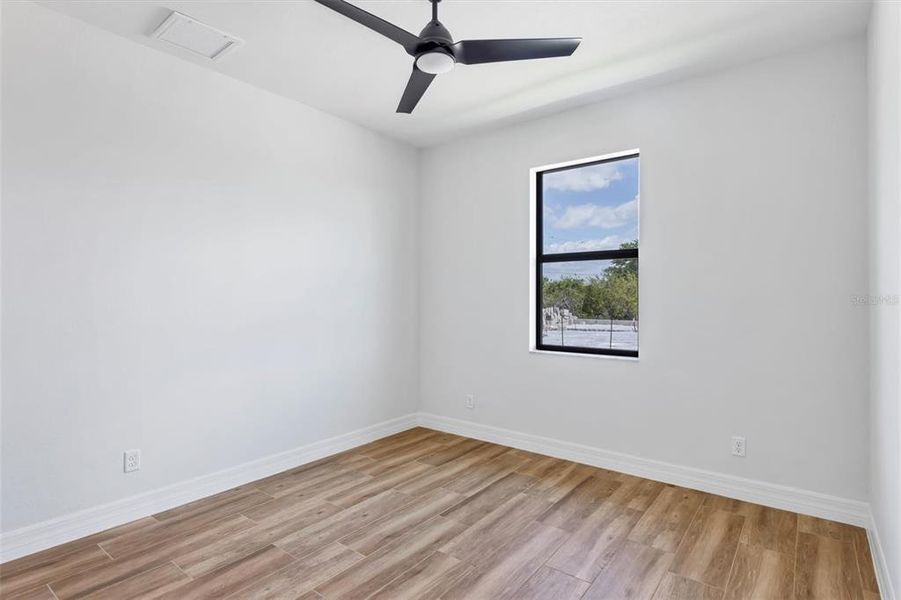 Spacious, unfurnished interior of a new home in , Port Charlotte (Image 9).