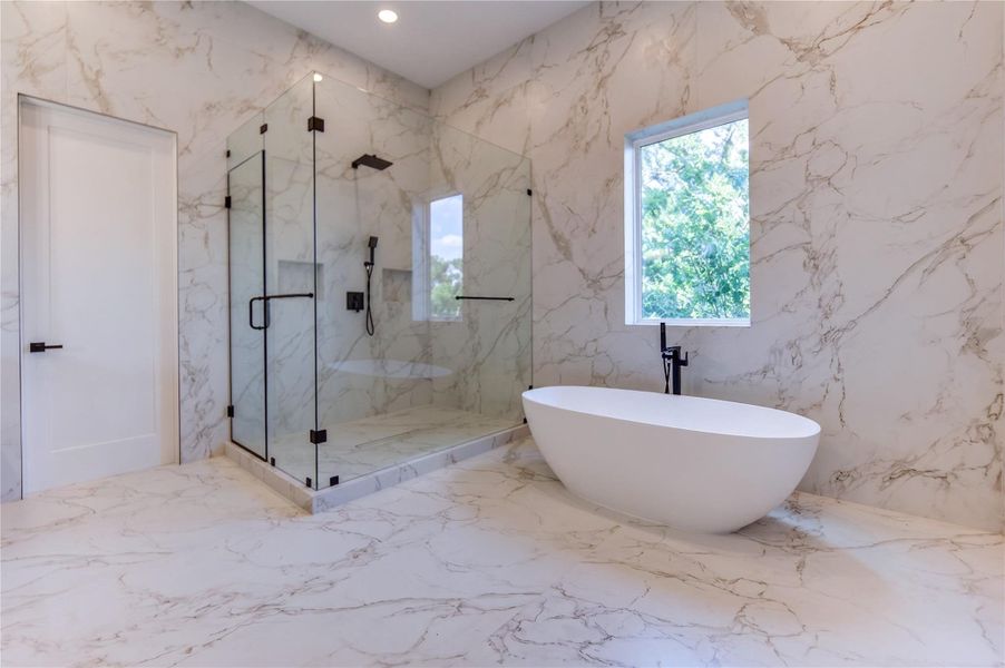 Beautiful tile carried up bathroom walls. Beautiful tile carried up bathroom walls.