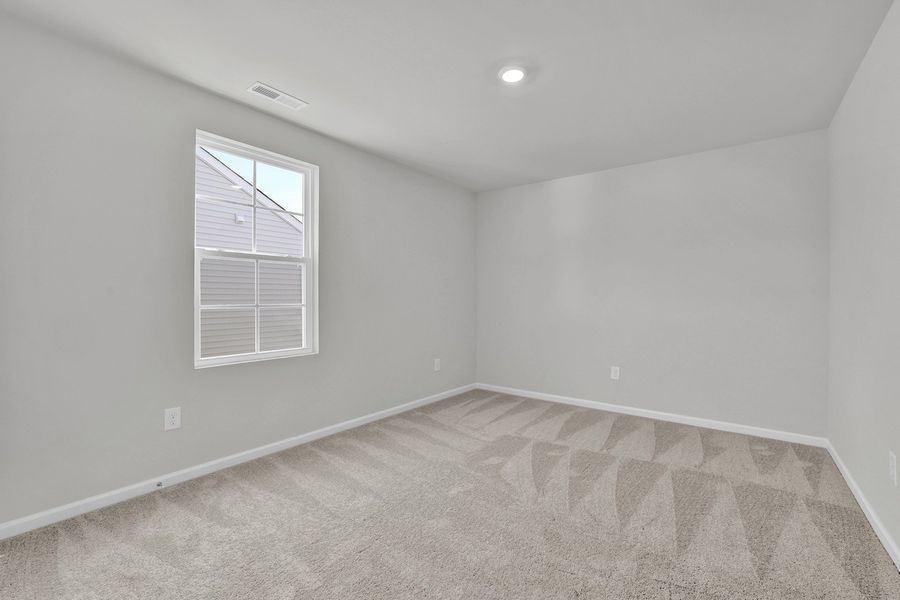 Spacious, unfurnished interior of a new home in River Tide Farms, Bolivia (Image 26).