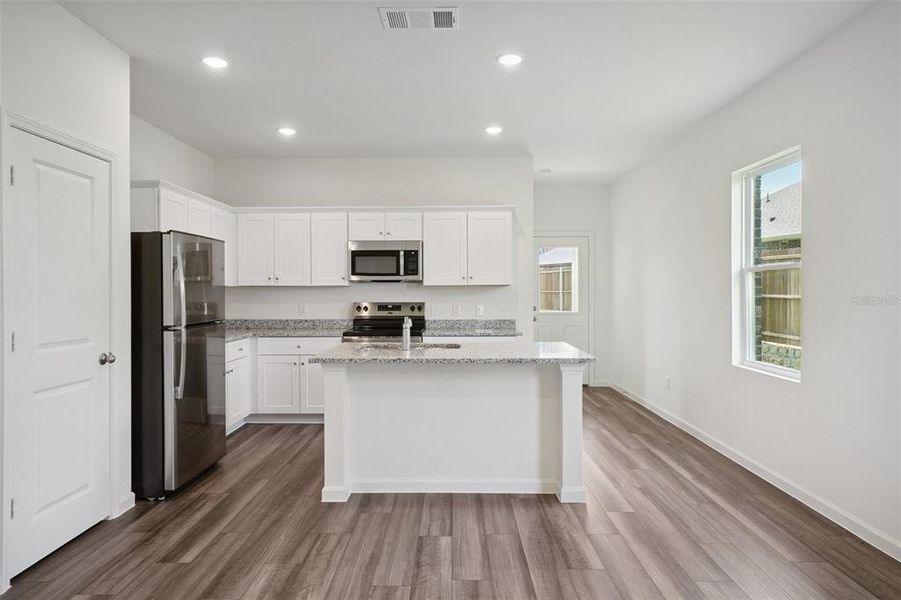 Furnished interior view inside a new home in , Deland (Image 14).