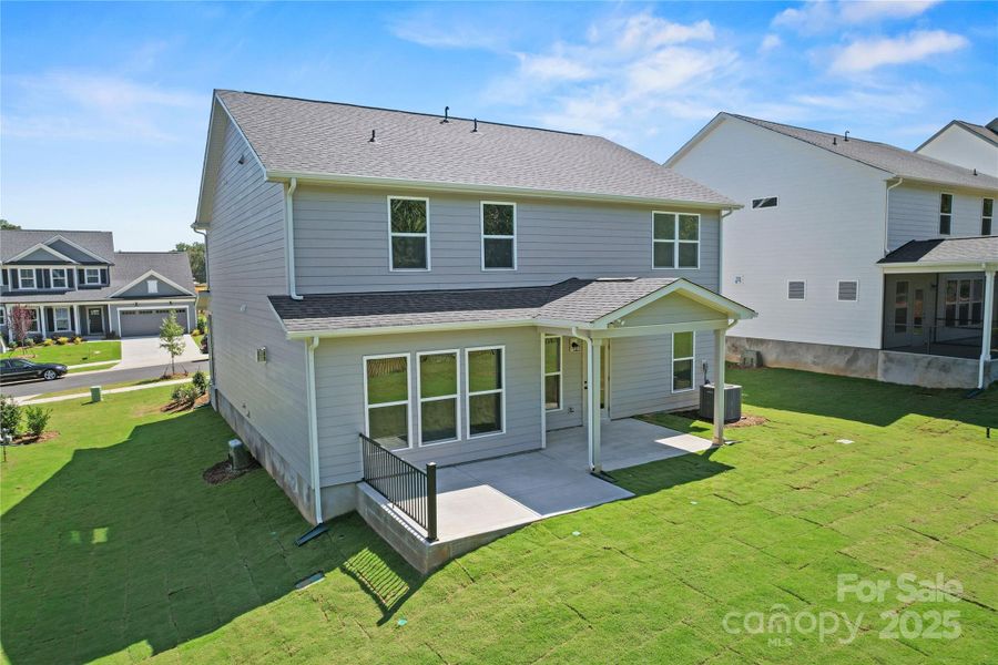 Exterior details and patio area of a home in Forest Creek, Waxhaw (Image 24).