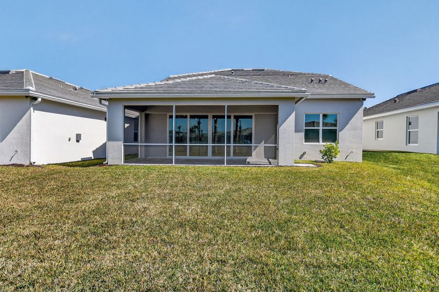 Exterior details and patio area of a home in Harbor Isle, Vero Beach (Image 4). Exterior details and patio area of a home in Harbor Isle, Vero Beach (Image 4).