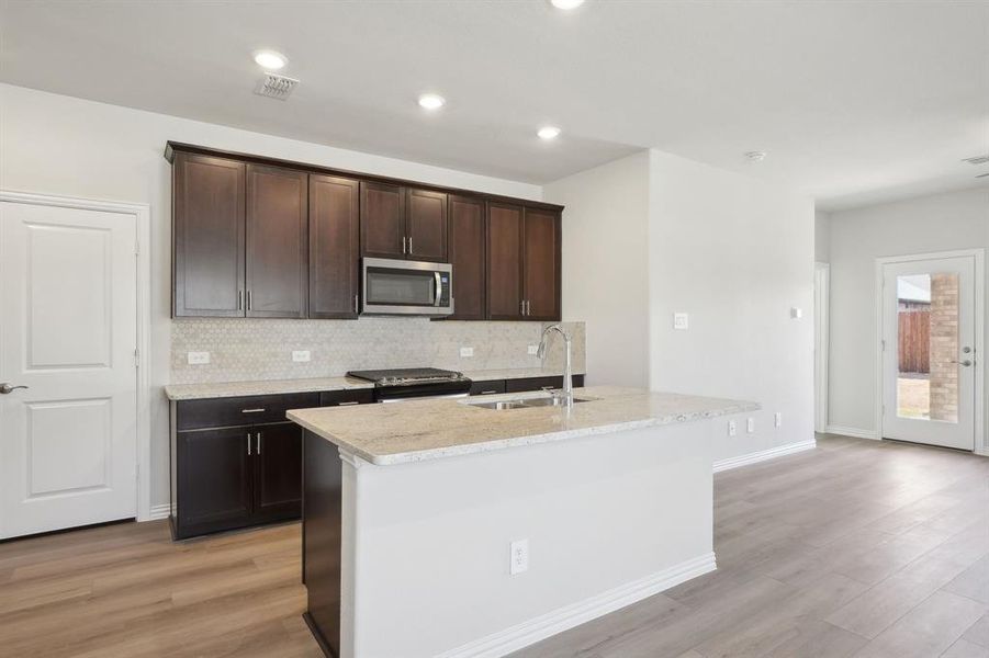 Photo is not of the actual home, but is an inspirational photo of builder’s model home and may depict options, furnishings, and/or decorator features that are not included. Photo is not of the actual home, but is an inspirational photo of builder’s model home and may depict options, furnishings, and/or decorator features that are not included.