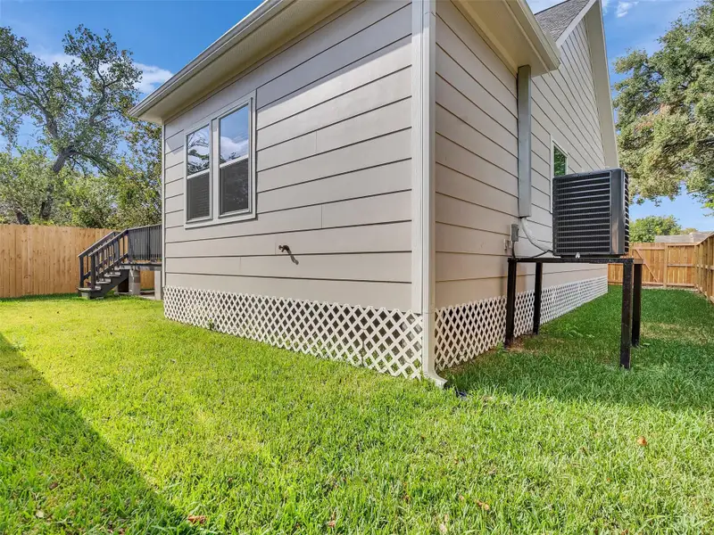 Exterior details and patio area of a home in , Houston (Image 3). Exterior details and patio area of a home in , Houston (Image 3).