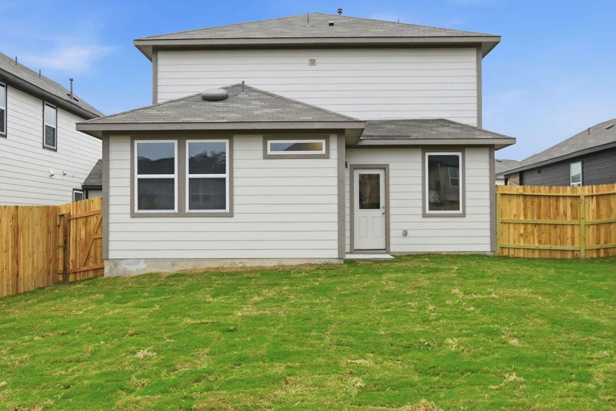 Rear of Home and Private Backyard