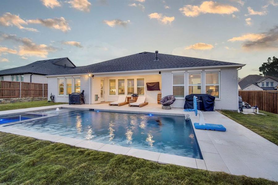 Exterior details and patio area of a home in Sweetgrass, Haslet (Image 26).