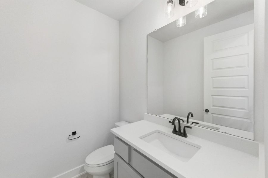 Furnished interior view inside a new home in The Colony, Bastrop (Image 6).