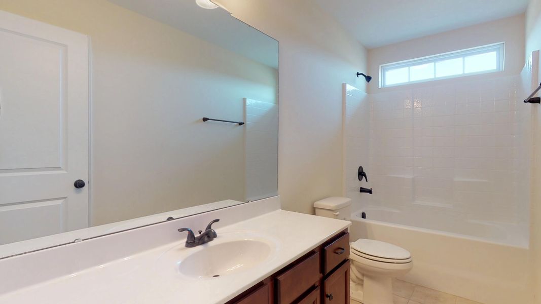 Representative furnished interior of a home built from the Rockbridge by Bill Clark Homes in Davenport Farms, Winterville (Image 18).