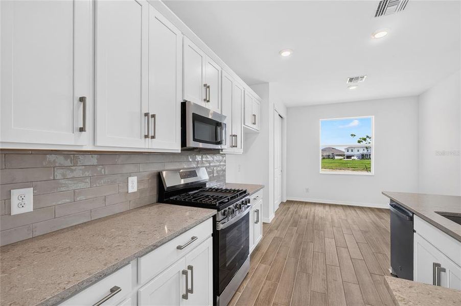 Furnished interior view inside a new home in The Sanctuary – Resort Collection, Punta Gorda (Image 5).