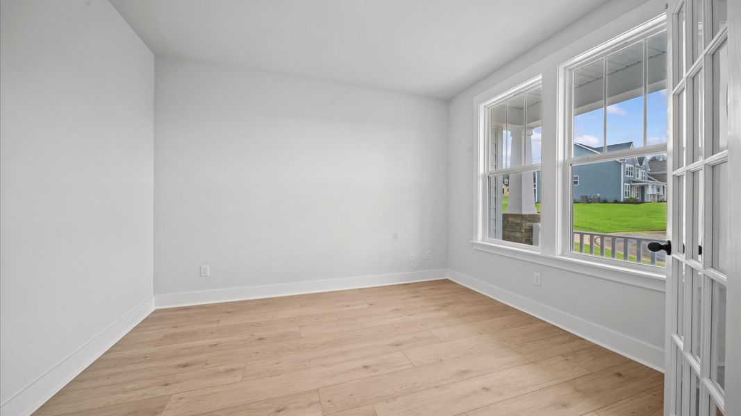 Accomplished study space featuring French doors and thoughtful design perfect for working from home