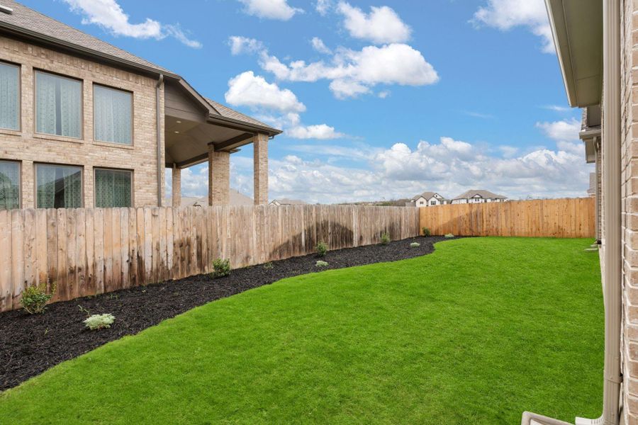 Beautifully landscaped backyard