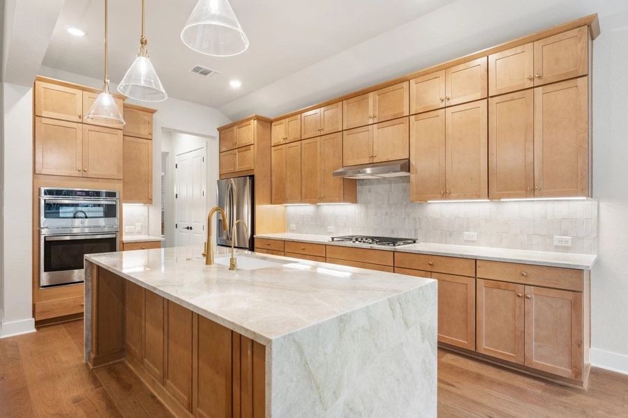 Furnished interior view inside a new home in The Estates at La Cima, San Marcos (Image 7).