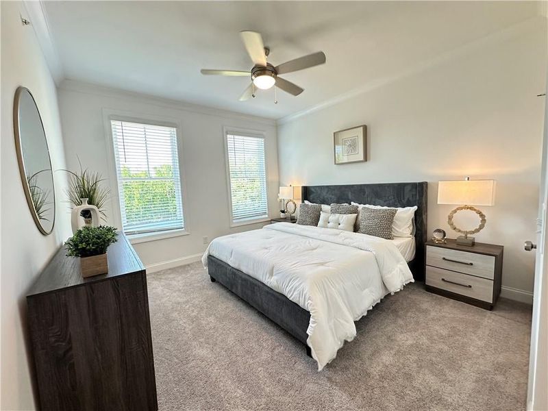 Owners Suite is bright with private wooded views *photos are from the Magnolia model at different home site*