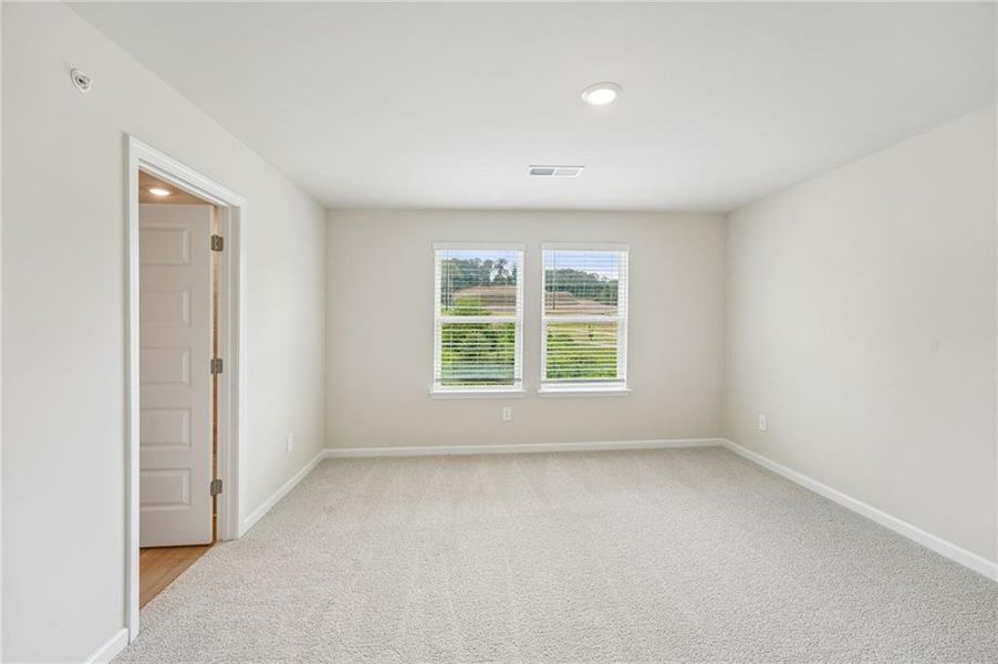 Spacious, unfurnished interior of a new home in Hemingway - Highland Series, Cumming (Image 39).