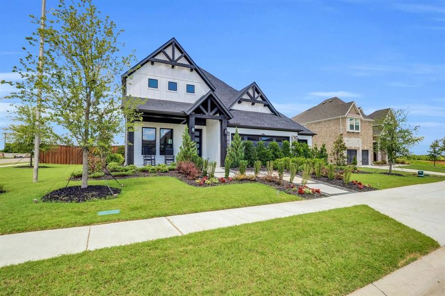 Front exterior of a new home in Polo Ridge, Mesquite, TX, highlighting curb appeal (Image 1).