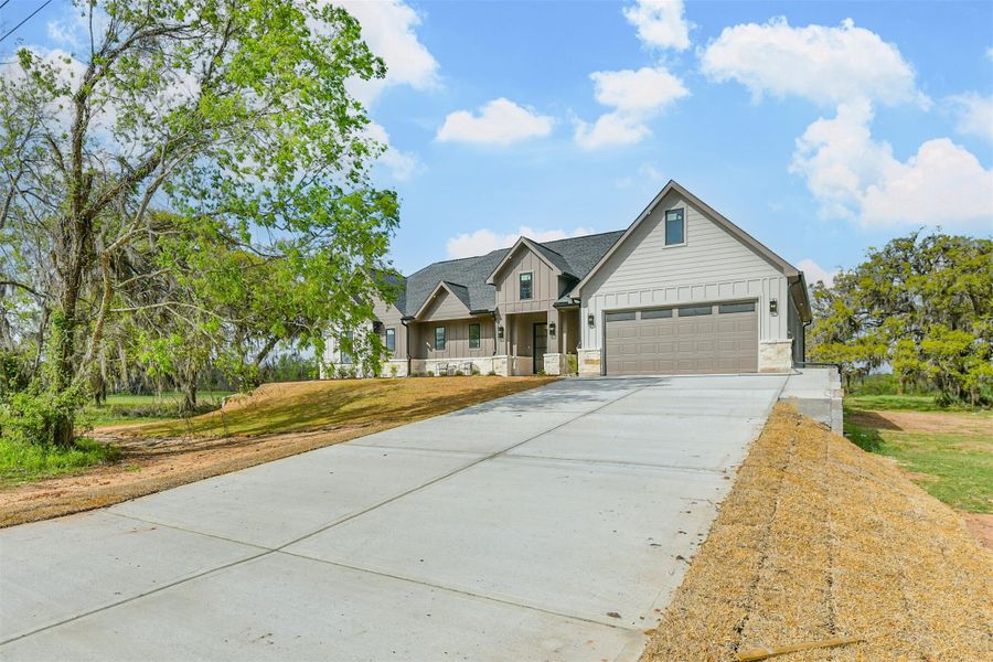 Front exterior of a new home in , Angleton, TX, highlighting curb appeal (Image 25). Front exterior of a new home in , Angleton, TX, highlighting curb appeal (Image 25).