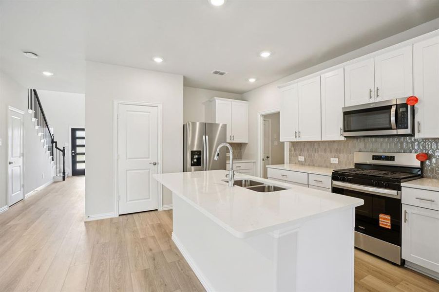 Furnished interior view inside a new home in Simpson Crossing - Spring Series, McKinney (Image 9). Furnished interior view inside a new home in Simpson Crossing - Spring Series, McKinney (Image 9).