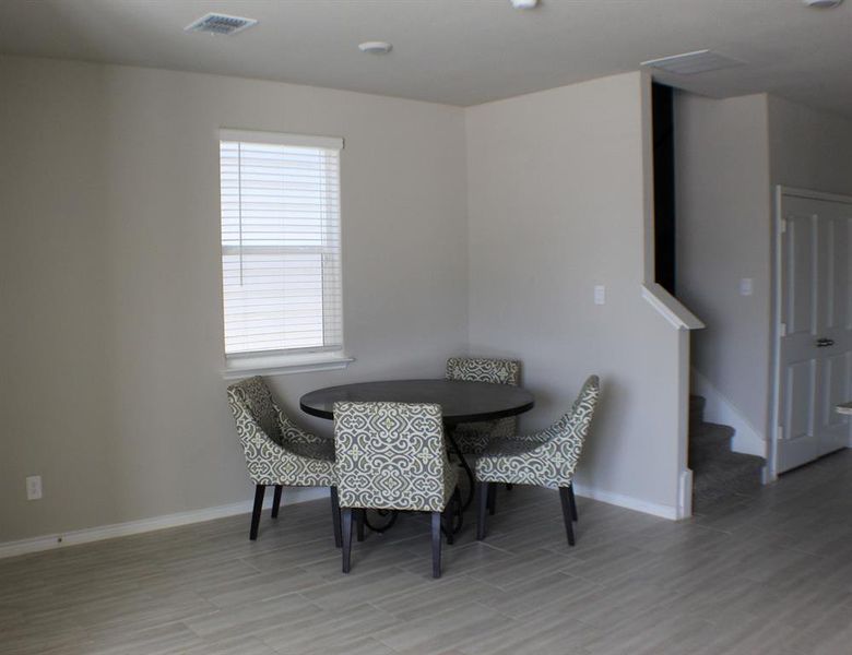 Dining area open to kitchen Dining area open to kitchen
