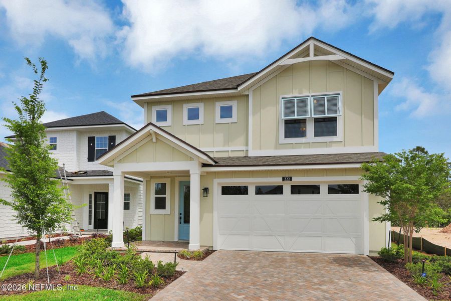 Front exterior of a new home in Seabrook Village at Seabrook, Ponte Vedra, FL, highlighting curb appeal (Image 25). Front exterior of a new home in Seabrook Village at Seabrook, Ponte Vedra, FL, highlighting curb appeal (Image 25).
