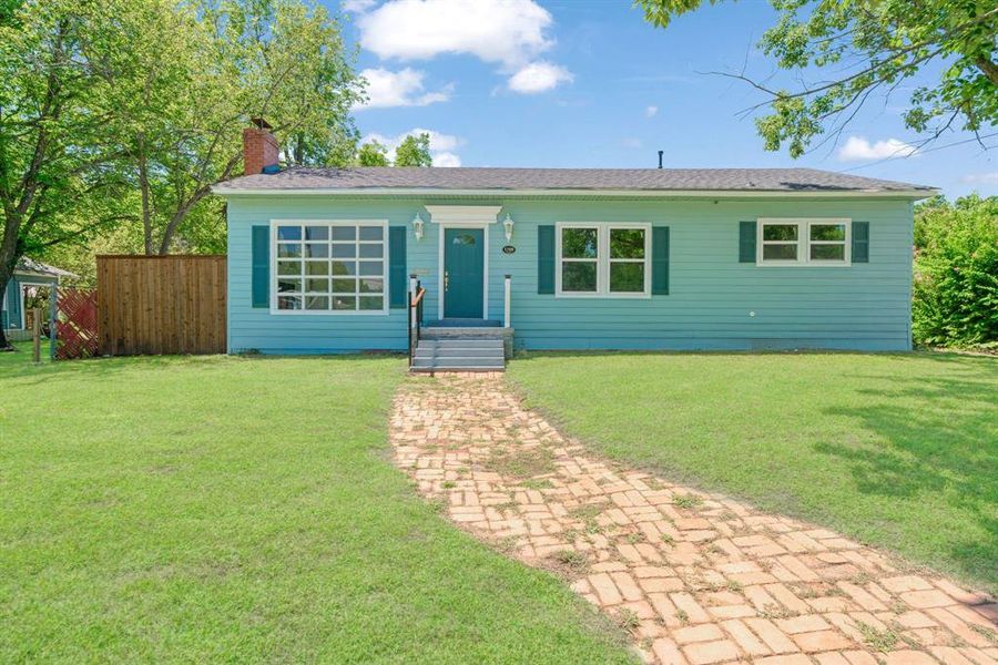 Front exterior of a new home in , Paris, TX, highlighting curb appeal (Image 17). Front exterior of a new home in , Paris, TX, highlighting curb appeal (Image 17).