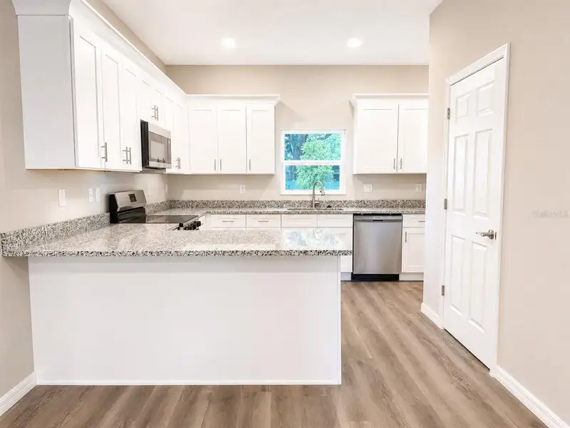 Furnished interior view inside a new home in , Tampa (Image 4).