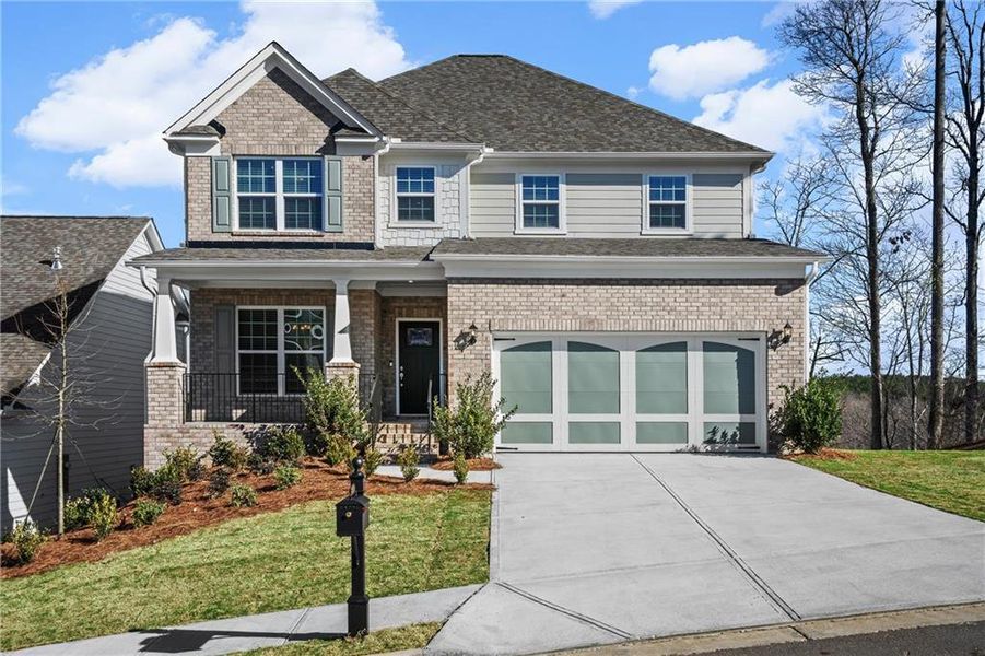 Front exterior of a new home in Sierra Creek, Hoschton, GA, highlighting curb appeal (Image 2).
