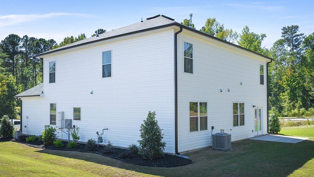 Representative exterior photo of a completed home built from the Elle by D.R. Horton in Highland Hills, Graniteville, SC (Image 21). Representative exterior photo of a completed home built from the Elle by D.R. Horton in Highland Hills, Graniteville, SC (Image 21).