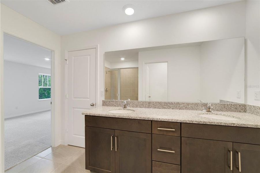 Furnished interior view inside a new home in Towns at Greenleaf, Oviedo (Image 9).