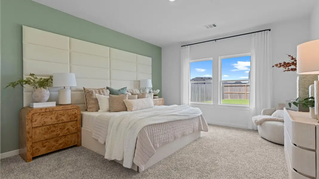 Furnished interior view inside a new home in Caldwell Crossing, Iowa Colony (Image 8).