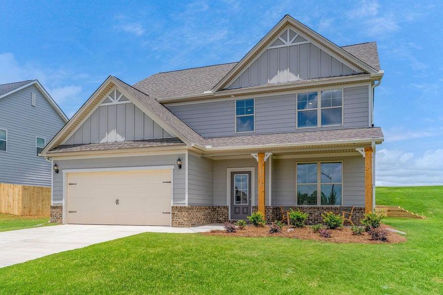 Front exterior of a new home in , Bonaire, GA, highlighting curb appeal (Image 27).