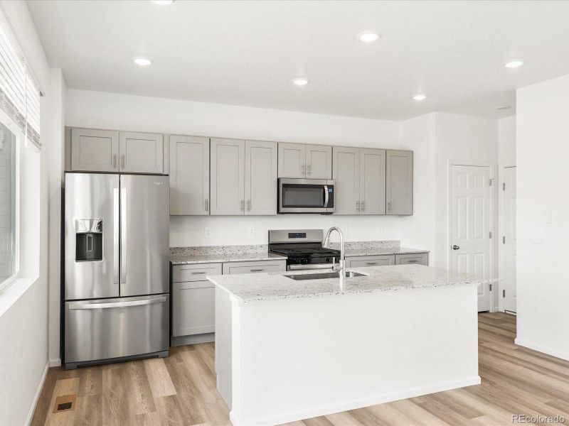 Furnished interior view inside a new home in Ridgeline Vista: The Flora Collection, Brighton (Image 10).