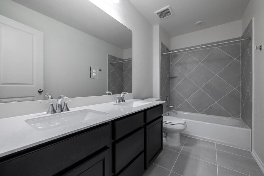 Furnished interior view inside a new home in Salerno - Heritage Collection, Round Rock (Image 6). Furnished interior view inside a new home in Salerno - Heritage Collection, Round Rock (Image 6).