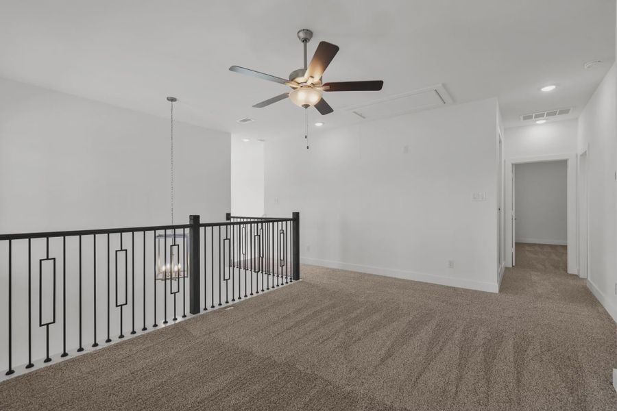 Representative unfurnished interior of a home built from the Sorenstam by Chesmar Homes in Riceland Alley Loads, Mont Belvieu (Image 24).